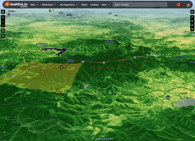 Bushfire.io showing the Sentinel-2 NDVI basemap in 3D over forested ranges in south-east Queensland, with a warning area and road closures