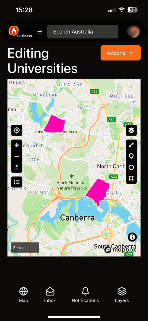 Custom layer editor with university sites drawn as areas over Canberra