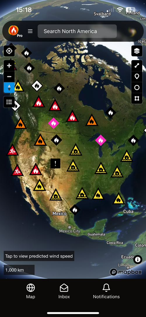 Possible Fire Ignitions as pink markers across North America in Bushfire.io Pro